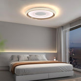 Modern bedroom with a ceiling light fixture and cityscape view.